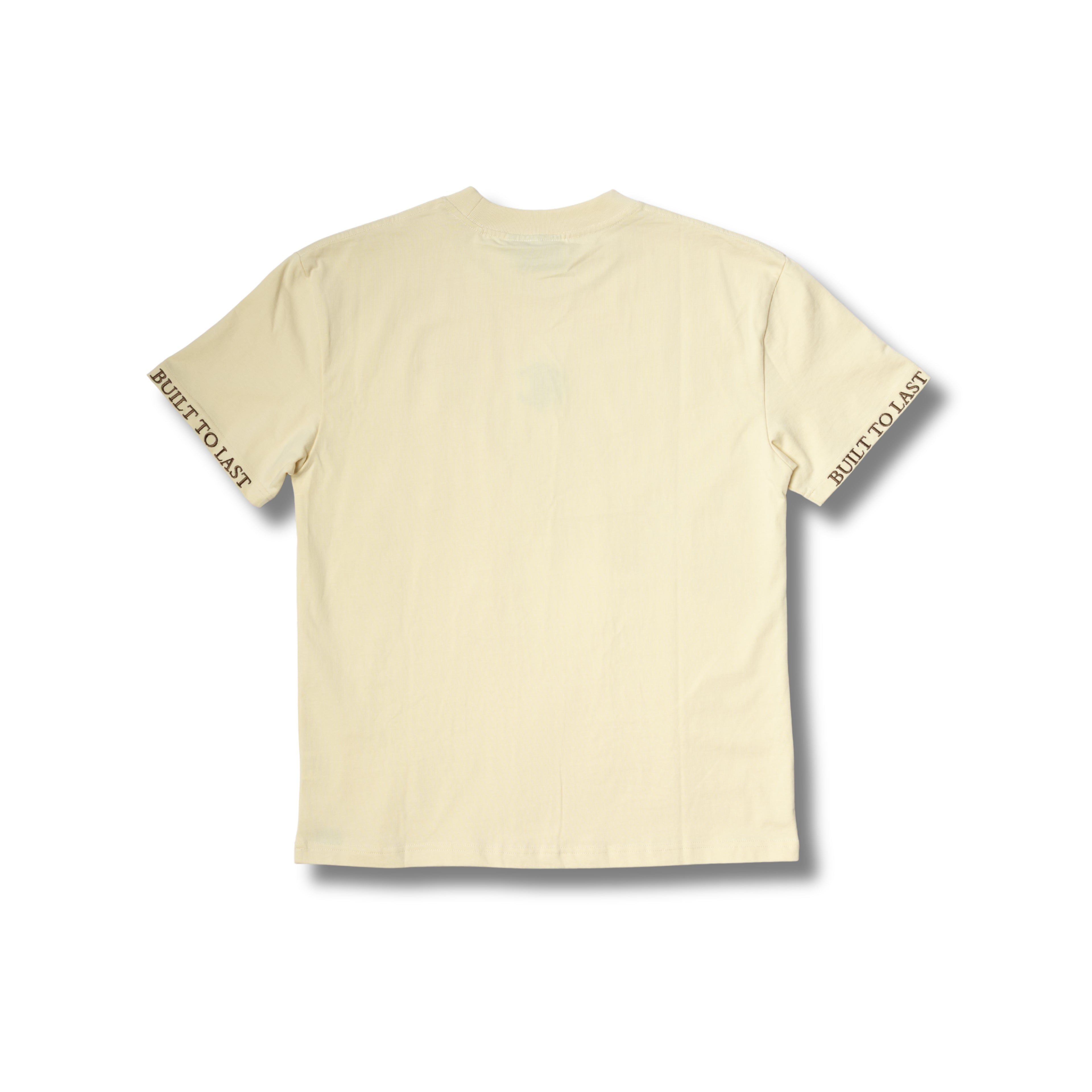 A cream-colored short-sleeve t-shirt with 'BUILT TO LAST' printed in black text along both sleeve cuffs, displayed flat against a white background.