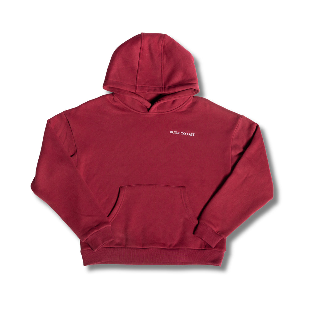 Flat lay full view of women's burgundy relaxed fit hoodie by Built To Last.