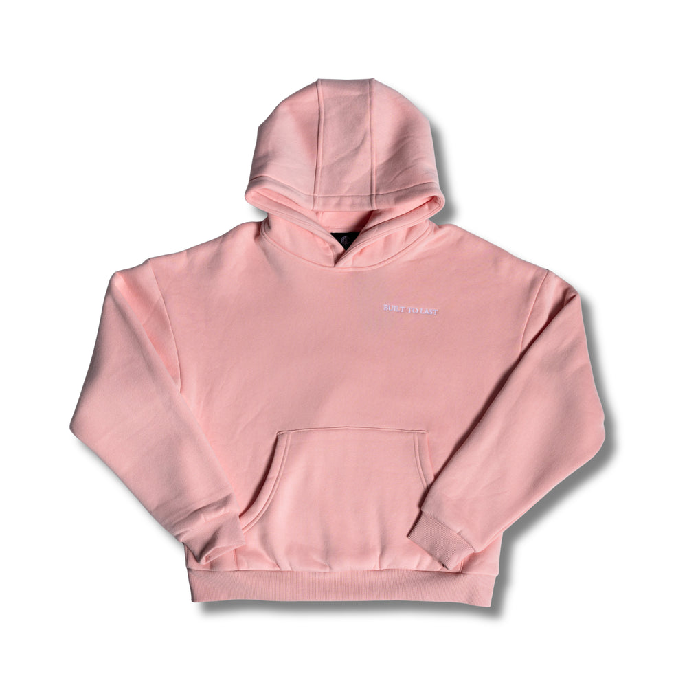 Flat lay full view of women's pink relaxed fit hoodie by Built To Last.