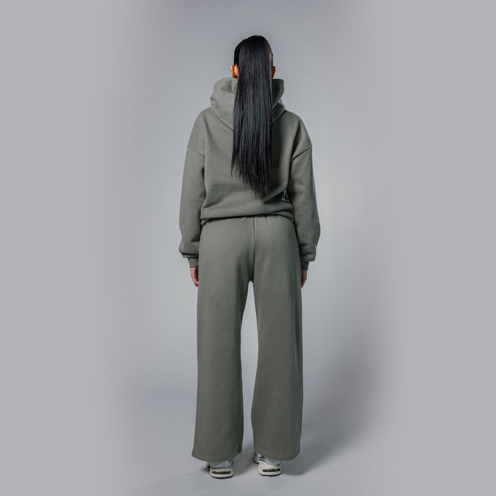 Back view of women's olive relaxed fit tracksuit set by Built To Last.