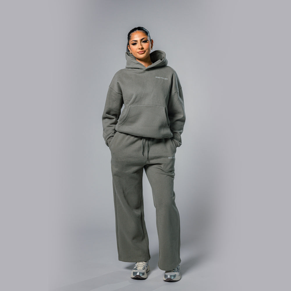 Front view of women's olive relaxed fit tracksuit set by Built To Last.