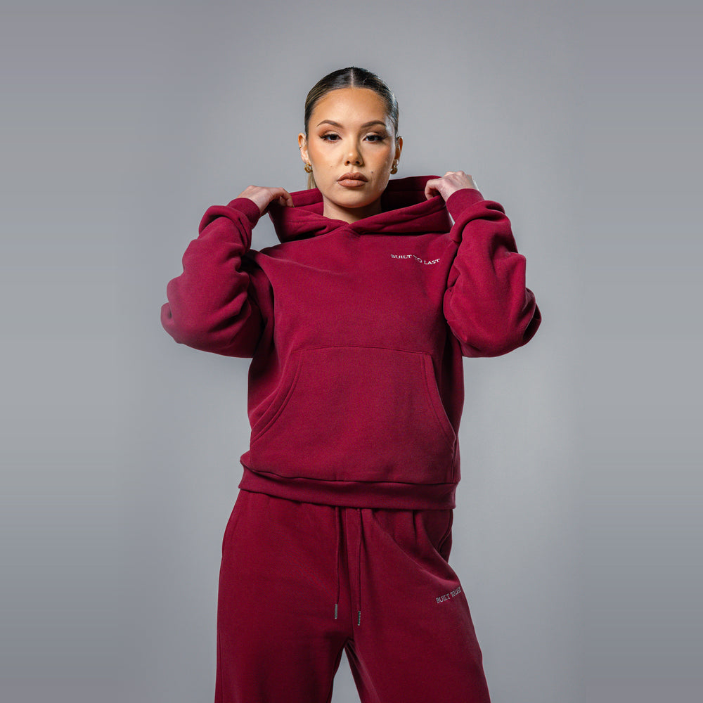 Women's burgundy relaxed fit hoodie and sweatpants tracksuit set by Built To Last.