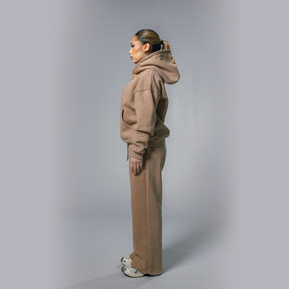 Profile detail of women's beige relaxed fit tracksuit set by Built To Last.