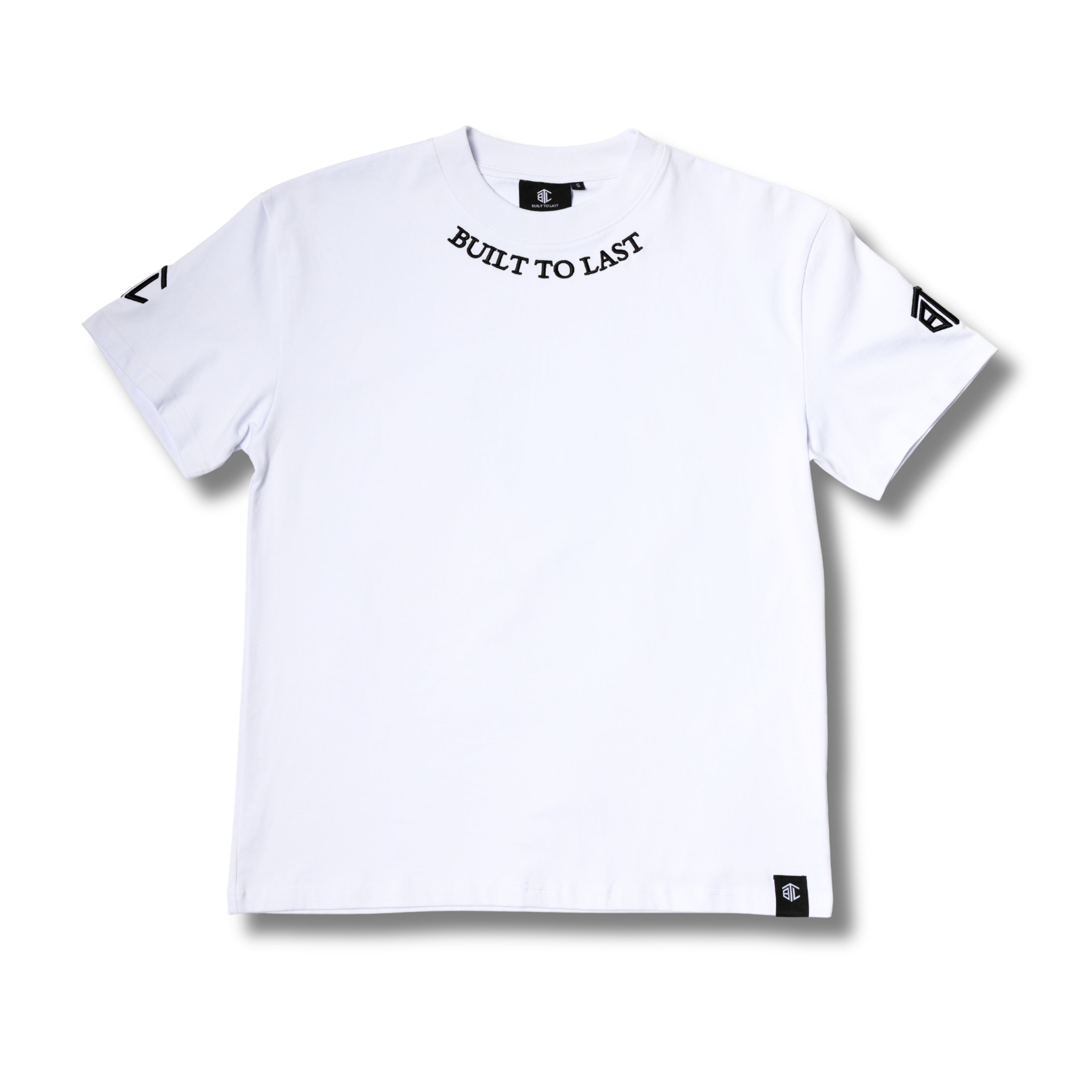 Front view of a white Built To Last Clothing t-shirt featuring branded collar text, sleeve logo patches, and a bottom hem label.