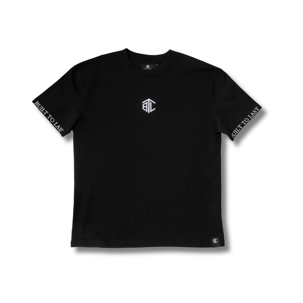 Front view of Built to Last Monolith Tee Black embroidered chest logo on premium heavyweight cotton T-shirt